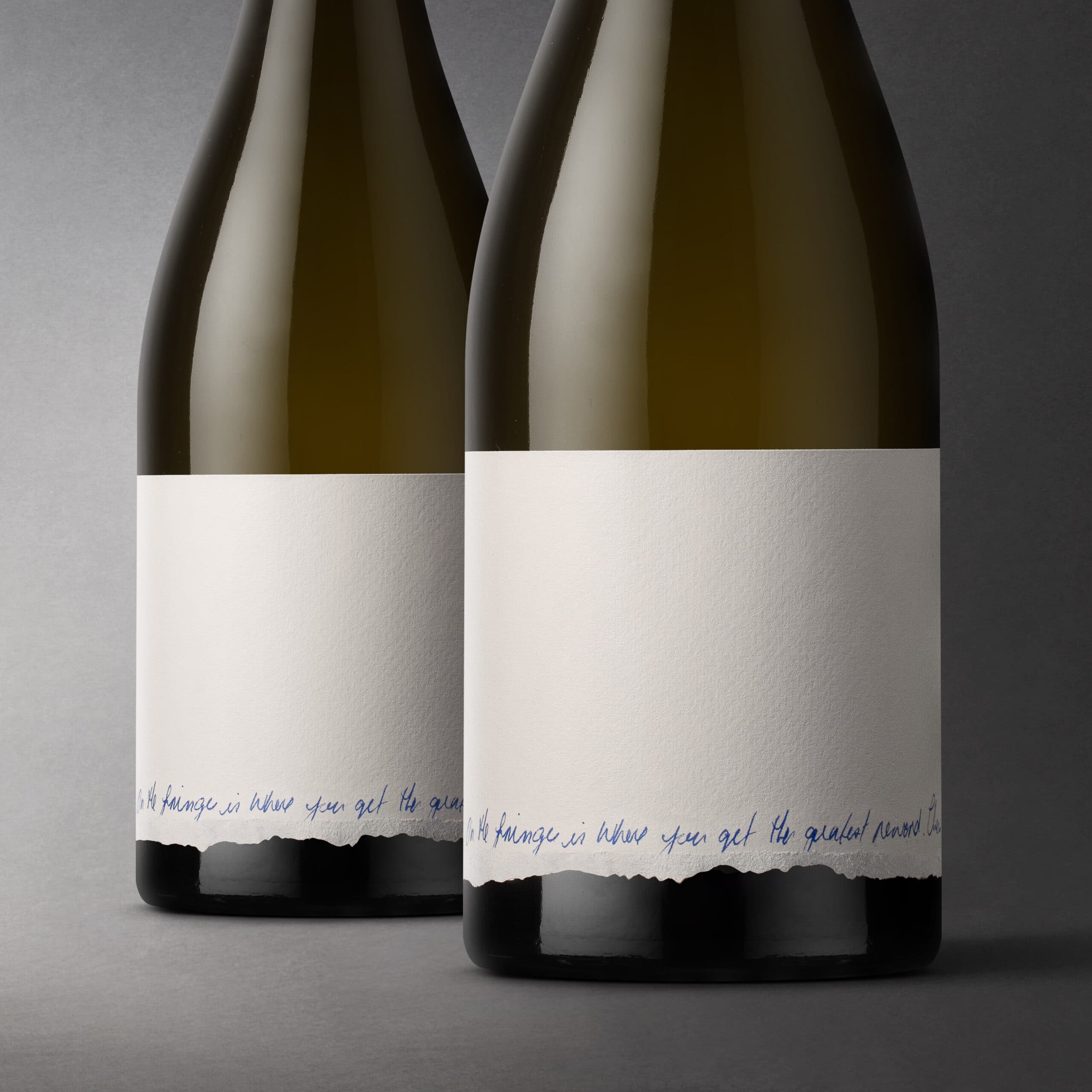 Image of Torn Edge label highlights the fringe